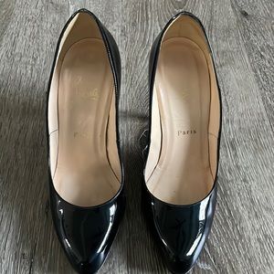 Christian Louboutin black patent leather pumps